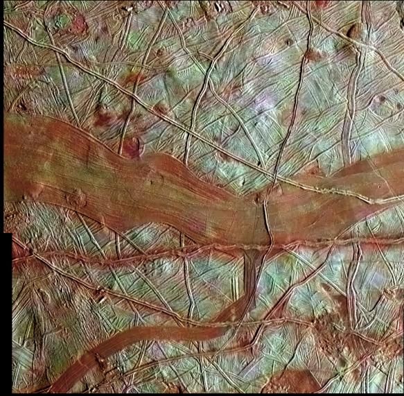 This colorized image of Jupiter's moon Europa is a product of clear-filter grayscale data from one orbit of NASA's Galileo spacecraft, combined with lower-resolution color data taken on a different orbit. The blue-white terrains indicate relatively pure water ice, whereas the reddish areas contain water ice mixed with hydrated salts, potentially magnesium sulfate or sulfuric acid.